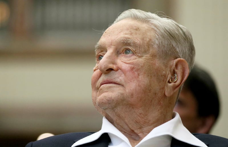 George Soros, founder and chairman of the Open Society Foundations, is ceding control of his $25 billion empire to his son, Alexander. AP