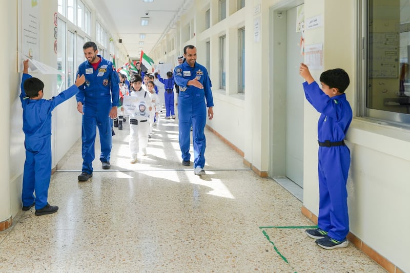The Emirates' space pioneers receive a heroes' welcome from pupils. More UAE space missions are planned