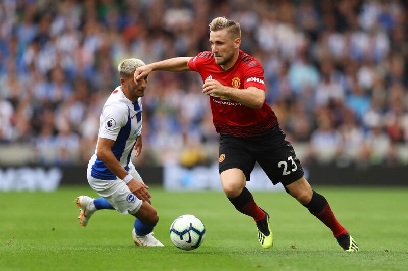 BRIGHTON, ENGLAND - AUGUST 19:  Luke Shaw of Manchester United runs past Anthony Knockaert of Brighton & Hove Albion during the Premier League match between Brighton & Hove Albion and Manchester United at American Express Community Stadium on August 19, 2018 in Brighton, United Kingdom.  (Photo by Dan Istitene/Getty Images)