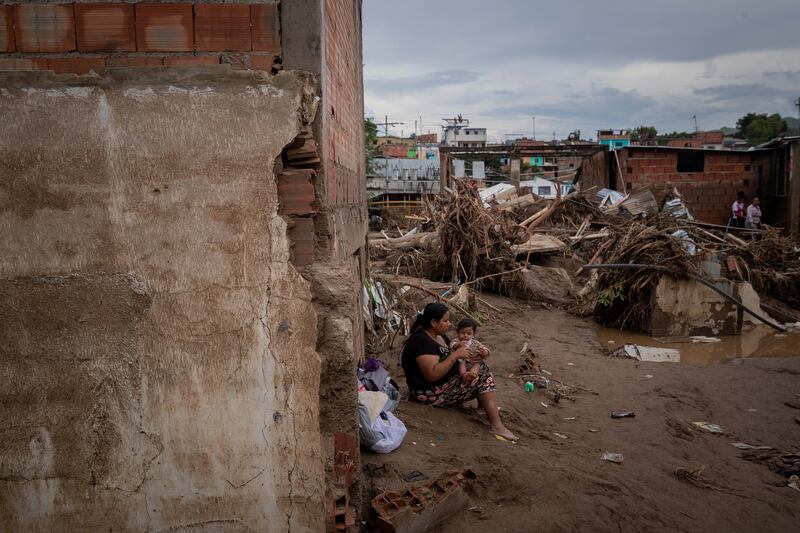 The downpour also triggered landslides that swept away several houses and shops in three other Venezuelan states. EPA