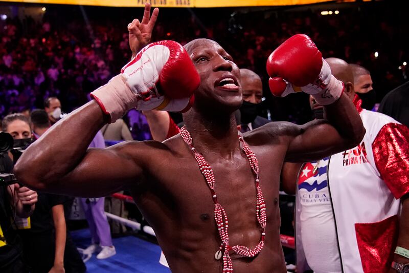 Cuba's Yordenis Uga celebrates his unanimous decision win over Manny Pacquiao.  AP