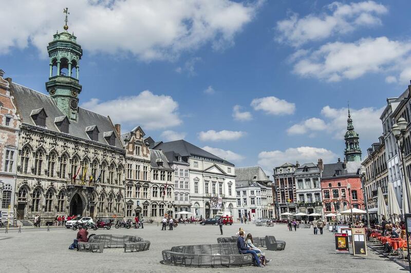 Grand Place in Mons, Belgium, a square dominated by an ornate Gothic town hall and lined with lively cafes. Mons is one of the two 2015 European Capitals of Culture, alongside Plzen. Gregory Mathelot / Mons 2015