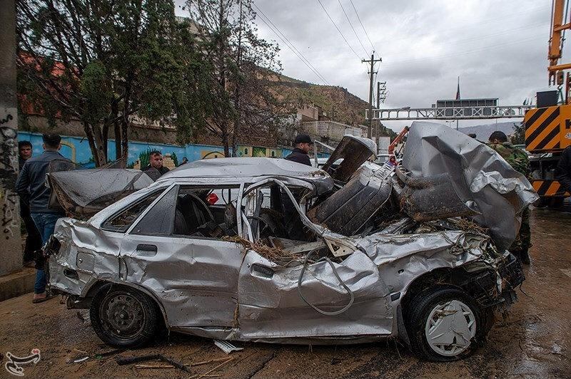 Damaged vehicles are seen after a flash flooding In Shiraz. Reuters