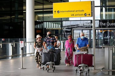 Travellers exit Heathrow Airport Terminal 2 in London, England. Getty Images