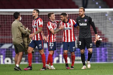 MADRID, SPAIN - MAY 12: Kieran Trippier of Atletico celebrates with Koke of Atletico Madrid during the La Liga Santander match between Atletico de Madrid and Real Sociedad at Estadio Wanda Metropolitano on May 12, 2021 in Madrid, Spain. Sporting stadiums around Spain remain under strict restrictions due to the Coronavirus Pandemic as Government social distancing laws prohibit fans inside venues resulting in games being played behind closed doors. (Photo by Denis Doyle/Getty Images)