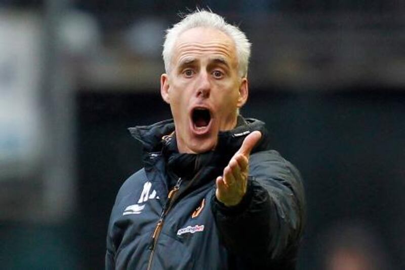 Wolverhampton Wanderers' Manager Mick McCarthy gestures during the English Premier League football match between Wolverhampton Wanderers and West Bromwich Albion at Molineux Stadium in Wolverhampton, west Midlands, on February 12, 2012. AFP PHOTO/IAN KINGTON



RESTRICTED TO EDITORIAL USE. No use with unauthorised audio, video, data, fixture lists, club/league logos or ‚Äúlive‚Äù services. Online in-match use limited to 45 images, no video emulation. No use in betting, games or single club/league/player publications.

 *** Local Caption ***  852937-01-08.jpg
