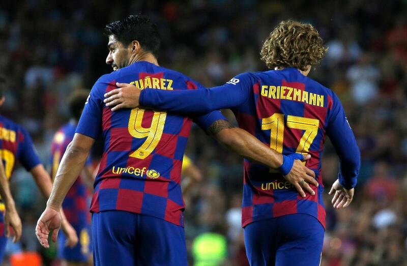 It was a happy first night at Camp Nou for Suarez and Griezmann as a pairing. AP Photo