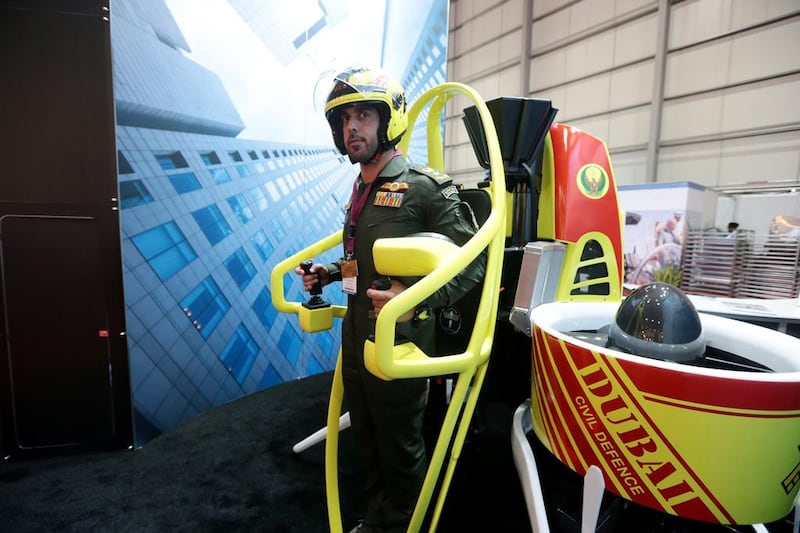 Lieutenant Colonel Osman Mohamed Ahli of the Dubai Civil Defence tries out a Martin Jetpack at the Dubai Airshow. Christopher Pike / The National
