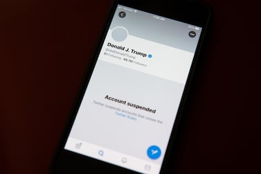 The suspended Twitter account of US President Donald Trump on a smartphone in Washington, on January 9, 2021. Bloomberg