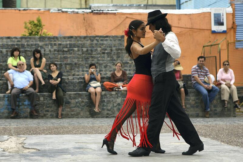 BUENOS AIRES, ARGENTINA - FEBRUARY 11:  A couple dance to tango music, Tango was born in the suburbs of Buenos Aires on February 11, 2008 in Buenos Aires, Argentina.  (Photo by Julian Finney/Getty Images)