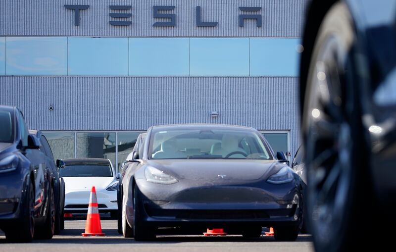 Tesla’s Model 3 is soaring in popularity in the UK. AP