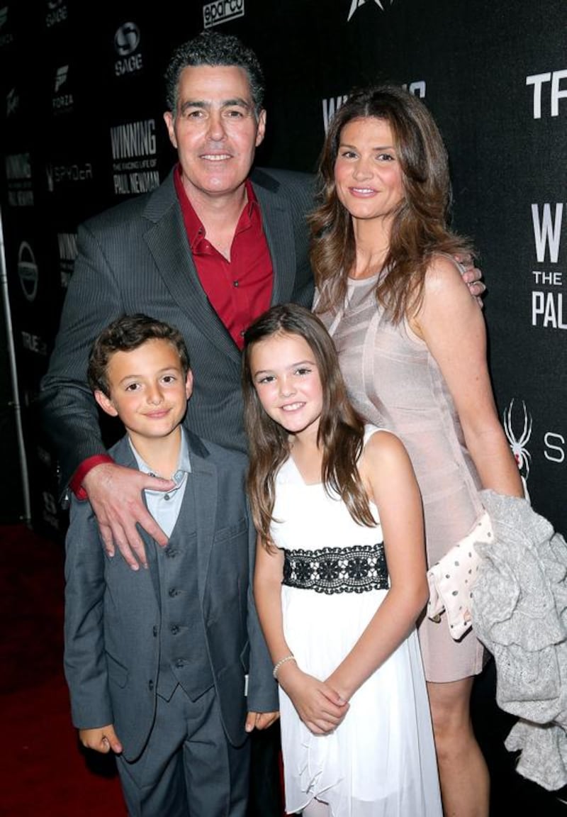 Adam Carolla with his wife, Lynette Paradise, and their twins, Santino and Natalia. Imeh Akpanudosen / Getty Images