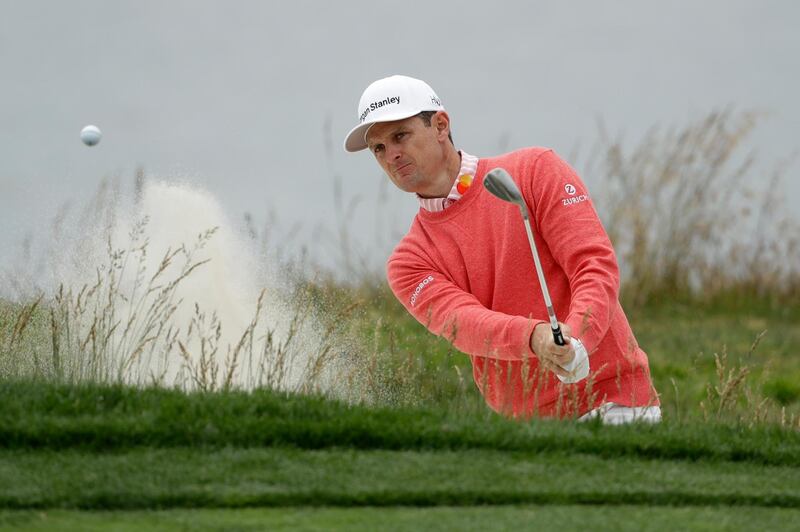 Justin Rose, of England, hits out of the bunker on the fifth hole during the first round of the U.S. Open Championship golf tournament Thursday, June 13, 2019, in Pebble Beach, Calif. (AP Photo/Marcio Jose Sanchez)