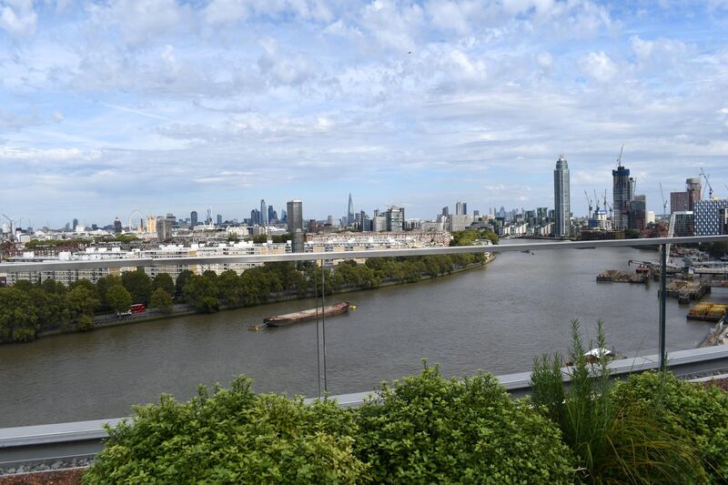 A view from the balcony of a penthouse in Circus West Village that looks over the River Thames. Shafi Musaddique / The National