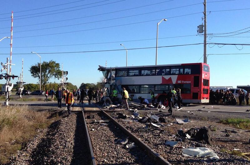 Witnesses said the bus ploughed directly into the side of the passing, four-car train. Terry Pedwell / The Canadian Press / AP Photo