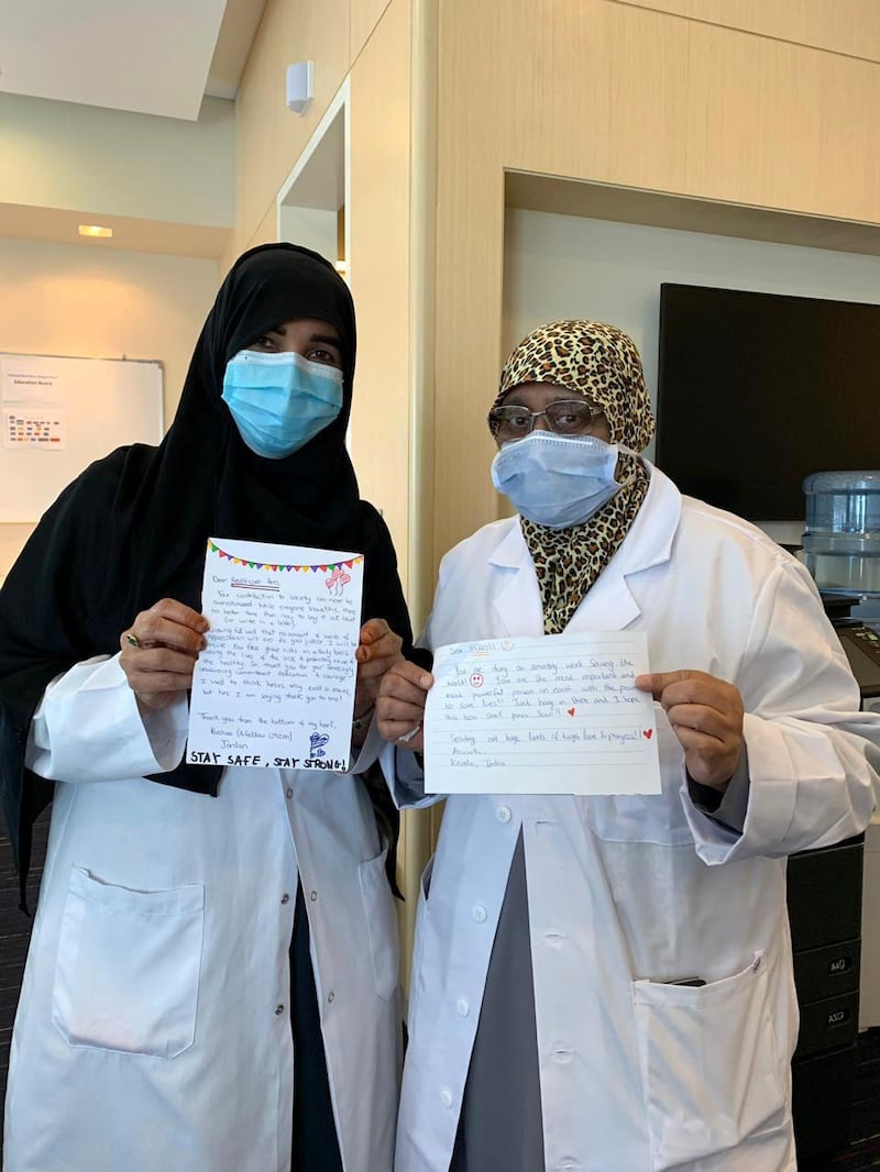 Abu Dhabi medical professionals with their letters. Courtesy Seha