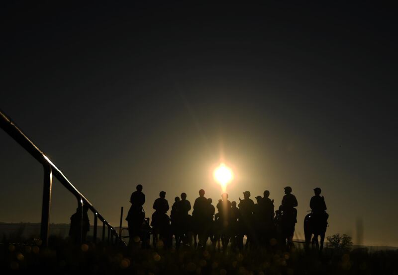 Runners and riders make their way towards the start of the Brain Tumour Research Handicap Chase at Taunton Racecourse on Monday, December 30. Getty