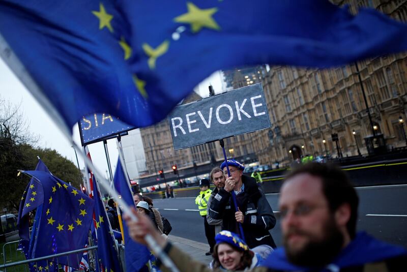 Anti-Brexit protesters are seen outside the Houses of Parliament, in London, Britain April 8, 2019. REUTERS/Henry Nicholls