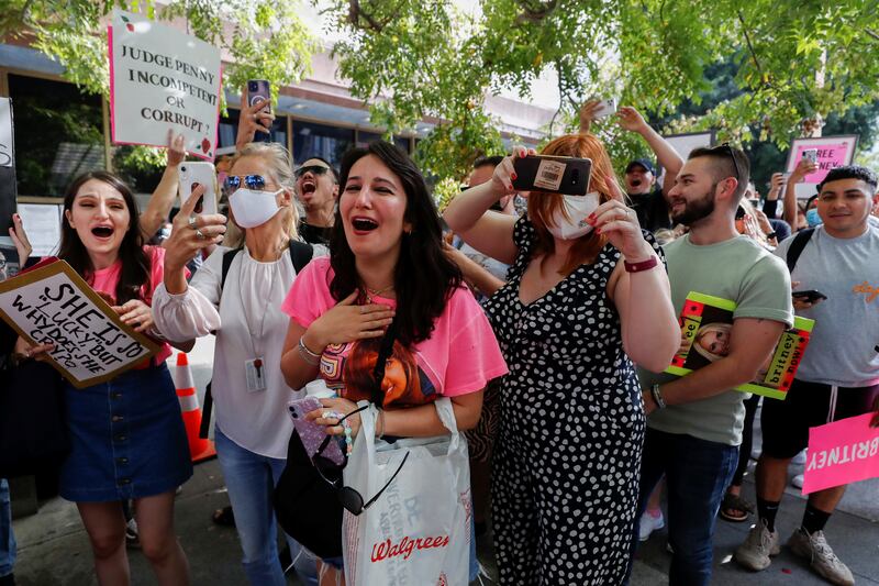 There was cheering and tears of happiness among the rallying supporters outside the courthouse. Reuters