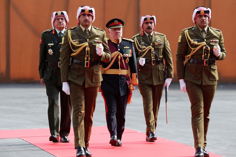 Jordan's King Abdullah reviews the honour guard during the opening ceremony of the fourth ordinary session of the 18th Parliament in Amman, Jordan. REUTERS