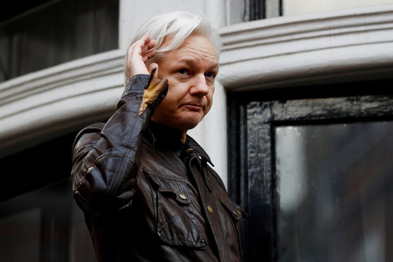 FILE PHOTO: WikiLeaks founder Julian Assange is seen on the balcony of the Ecuadorian Embassy in London, Britain, May 19, 2017. REUTERS/Peter Nicholls/File Photo