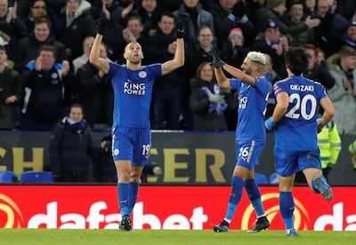 Soccer Football - Premier League - Leicester City vs Huddersfield Town - King Power Stadium, Leicester, Britain - January 1, 2018   Leicester City's Islam Slimani celebrates scoring their second goal with team mates            REUTERS/Darren Staples    EDITORIAL USE ONLY. No use with unauthorized audio, video, data, fixture lists, club/league logos or "live" services. Online in-match use limited to 75 images, no video emulation. No use in betting, games or single club/league/player publications.  Please contact your account representative for further details.