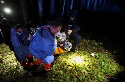 Kader, 39, a Syrian migrant from Homs, is rescued at the border, near Topczykaly, Poland. Reuters