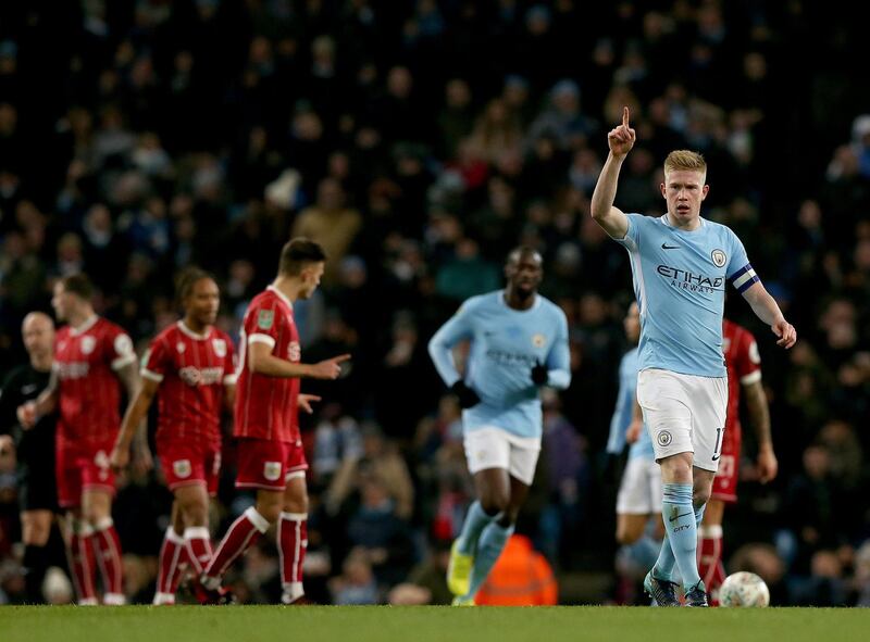 epa06427690 Manchester City's Kevin De Bruyne (R) celebrates scoring during the Carabao Cup semi final first leg match between Manchester City and Bristol City at the Etihad Stadium in Manchester, Britain, 09 January 2018.  EPA/Nigel Roddis EDITORIAL USE ONLY. No use with unauthorised audio, video, data, fixture lists, club/league logos 'live' services. Online in-match use limited to 75 images, no video emulation. No use in betting, games or single club/league/player publications.