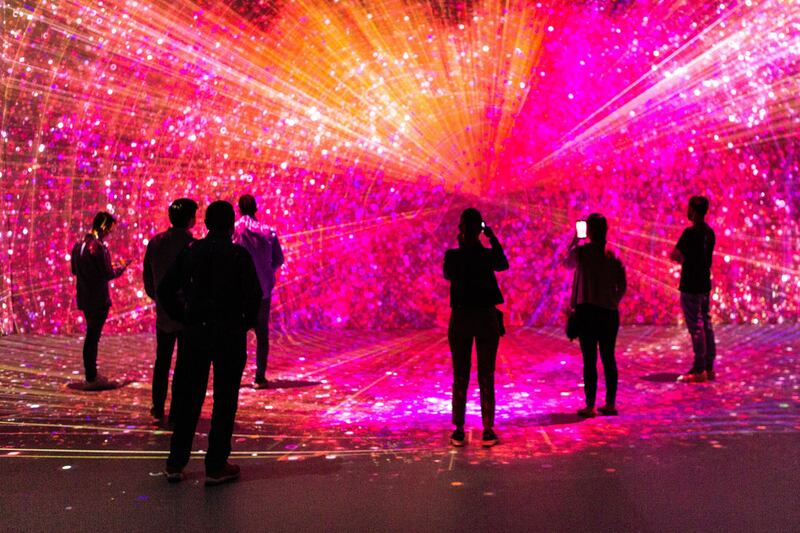 Visitors in the City Cloud space during the Mobile World Congress at the Fira in Barcelona, Spain.