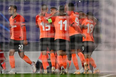 Shakhtar Donetsk players celebrate their third goal during the Champions League victory at Real Madrid. AFP