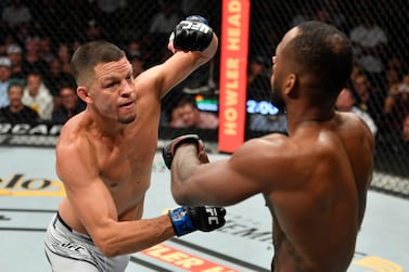 GLENDALE, ARIZONA - JUNE 12: (L-R) Nate Diaz punches Leon Edwards of Jamaica in their welterweight fight during the UFC 263 event at Gila River Arena on June 12, 2021 in Glendale, Arizona. (Photo by Jeff Bottari/Zuffa LLC)