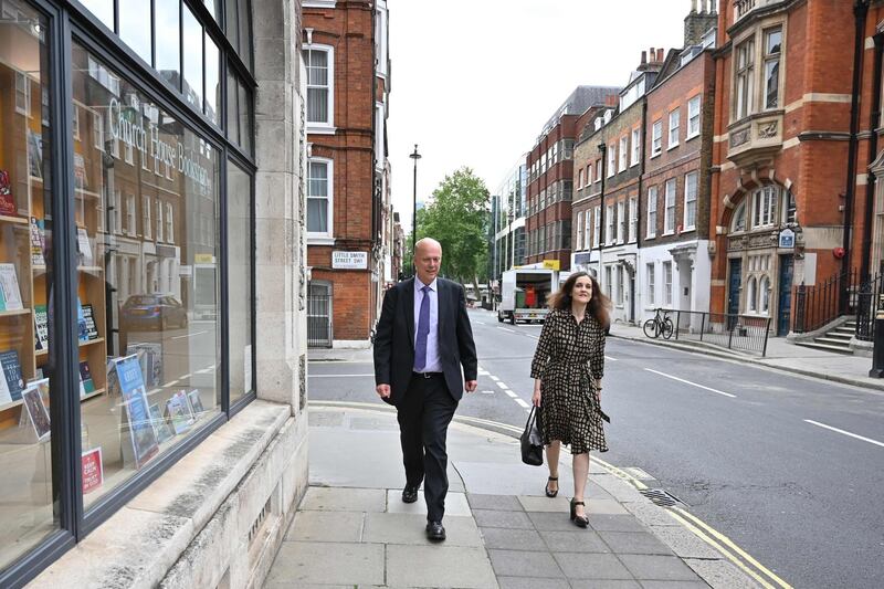 Former ministers Conservative MPs Chris Grayling (L) and Theresa Villiers (R), members of  the British parliament's intelligence and security committee (ISC), leave the committees offices in central London on July 16, 2020.  A long-awaited report into alleged Russian interference in the Brexit vote will be published within days, the intelligence and security committee (ISC) said Thursday. The 50-page report was completed last year but its publication was delayed by the general election in December, which caused all parliamentary committees to be disbanded. Prime Minister Boris Johnson last week nominated new members to the committee, which oversees the intelligence agencies, and they held their first meeting on Thursday.
 / AFP / JUSTIN TALLIS
