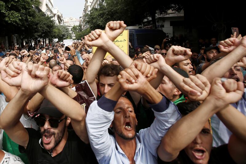 Demonstrators gesture during a protest rejecting Algerian election announcement for December, in Algiers, Algeria. REUTERS