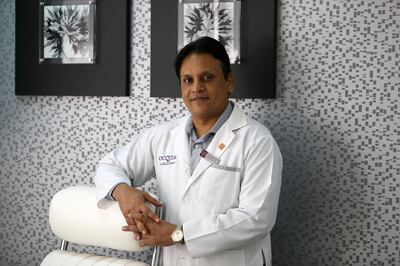 DUBAI , UNITED ARAB EMIRATES : Nov 11 , 2013 :- Dr Sanjay Parashar , Plastic Surgeon at his office in the Cocoona Clinic on Al Wasl road in Dubai. ( Pawan Singh / The National ) . For News. Story by Ramola
 *** Local Caption ***  PS1111- SURGEON07.jpg
