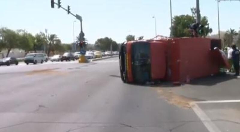 Emergency services were called into action after a lorry overturned on an Abu Dhabi Road. 