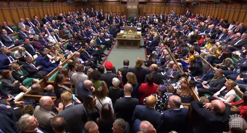 A video grab from footage broadcast by the UK Parliament's Parliamentary Recording Unit (PRU) shows MPs waiting in the chamber for the result of the vote on the Standing Order 24 emergency debate on a no-deal Brexit in the House of Commons in London on September 3, 2019. Prime Minister Boris Johnson was braced for a showdown with parliament on Tuesday over his Brexit plan that could spark a snap election and derail Britain's exit from the European Union next month. - RESTRICTED TO EDITORIAL USE - MANDATORY CREDIT " AFP PHOTO / PRU " - NO USE FOR ENTERTAINMENT, SATIRICAL, MARKETING OR ADVERTISING CAMPAIGNS - EDITORS NOTE THE IMAGE HAS BEEN DIGITALLY ALTERED AT SOURCE TO OBSCURE VISIBLE DOCUMENTS
 / AFP / PRU / - / RESTRICTED TO EDITORIAL USE - MANDATORY CREDIT " AFP PHOTO / PRU " - NO USE FOR ENTERTAINMENT, SATIRICAL, MARKETING OR ADVERTISING CAMPAIGNS - EDITORS NOTE THE IMAGE HAS BEEN DIGITALLY ALTERED AT SOURCE TO OBSCURE VISIBLE DOCUMENTS
