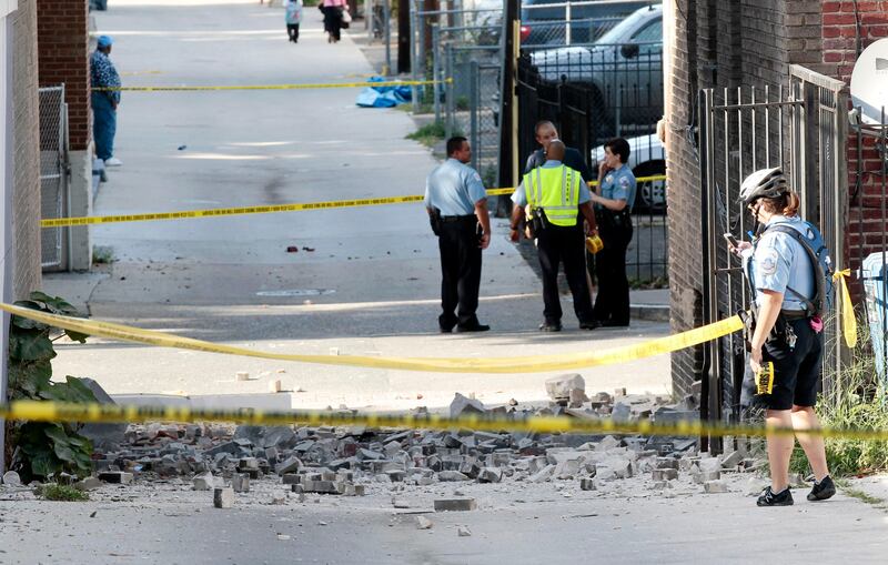 Police block off the alley behind the Embassy of Ecquador in Washington after part of the building sustained damages, Tuesday, Aug. 23, 2011, after a earthquake in the Washington area. (AP Photo/Pablo Martinez Monsivais) *** Local Caption ***  East Coast Quake.JPEG-032d2.jpg