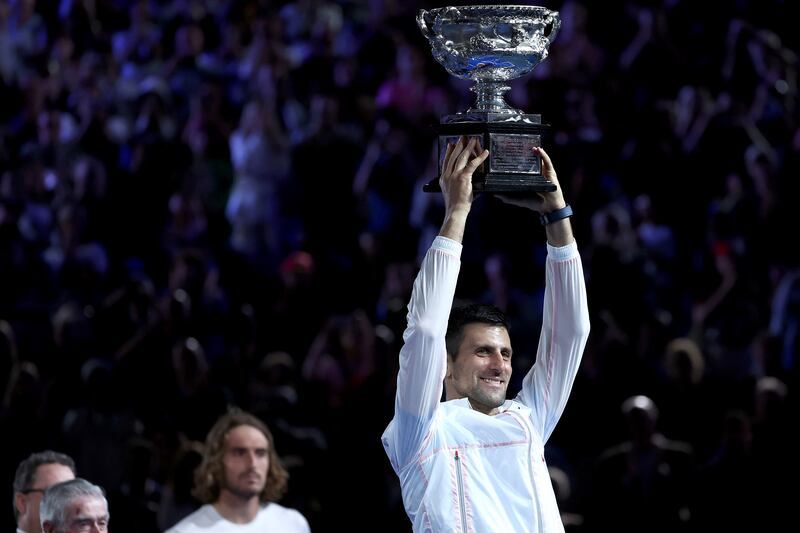 Novak Djokovic lifts the Australian Open trophy. Getty 