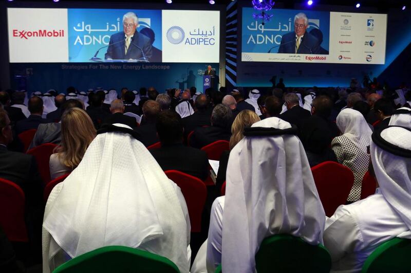 Rex Tillerson, the chief executive of ExxonMobil, speaks at the opening ceremony of Adipec. Nezar Balout / AFP