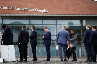 Delegates queue for a fringe event on the third day of the Conservative Party Conference in 2021. Getty