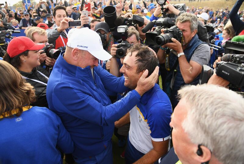 Francesco Molinari celebrates winning The Ryder Cup with Captain Thomas Bjorn. Getty Images