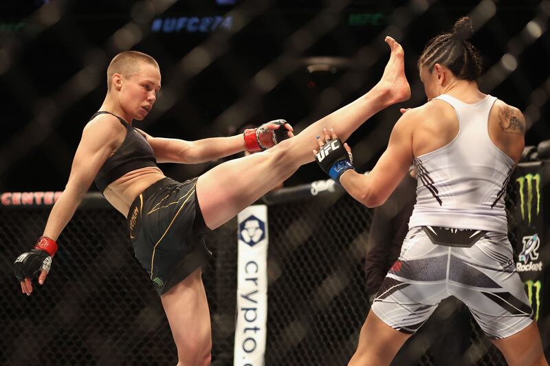 Rose Namajunas kicks Carla Esparza in their women’s strawweight championship bout at UFC 274. Getty
