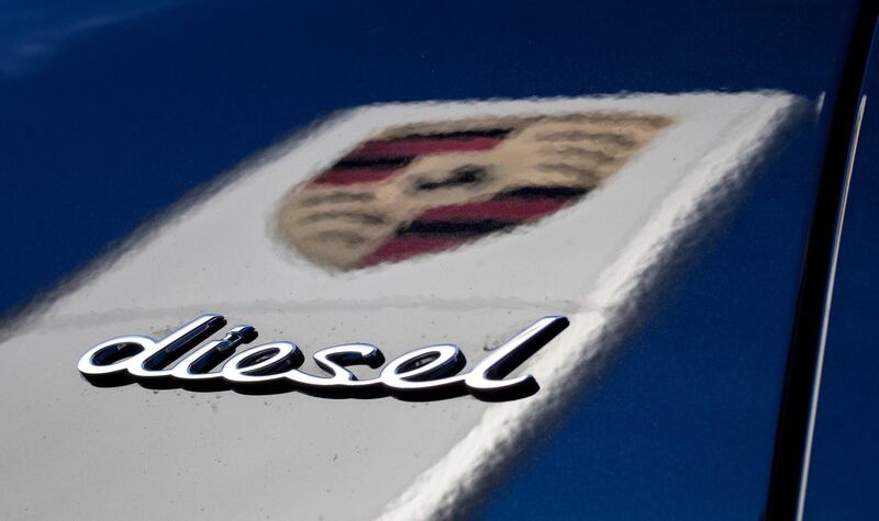 FILE -- In this Wednesday, Nov. 4, 2015 photo the word 'Diesel' and the logo of the German car manufacturer Porsche is pictured in Stuttgart, Germany.  Porsche's chief executive Oliver Blum says the sports car maker won't produce any new diesel models in the wake of parent company Volkswagen's diesel emissions scandal. (Christoph Schmidt/dpa via AP)