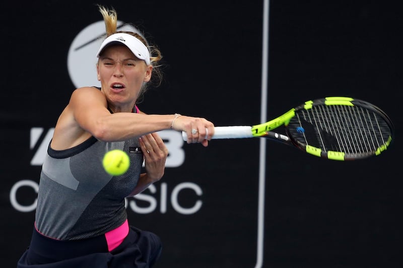 Caroline Wozniacki of Denmark hits a return against Sachia Vickery of the US during their women's singles semi-final match at the WTA Auckland Classic tennis tournament in Auckland on January 6, 2018. / AFP PHOTO / MICHAEL BRADLEY