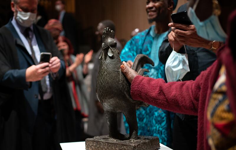 The looted Benin bronze known as the Okukur during a ceremony at Jesus College in Cambridge, from which it is being returned to Nigeria. PA