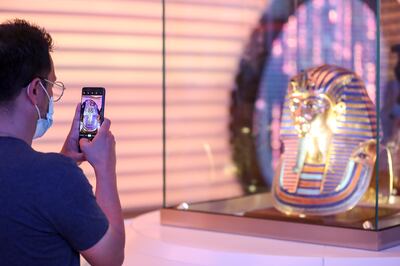 A modern replica of the Golden Mask of King Tutankhamun made out of more than 10kg gold and precious stones at the Egypt Pavilion, at Expo 2020 Dubai. Khushnum Bhandari / The National