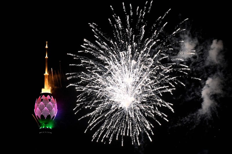 Fireworks next to the lit-up Lotus Tower during celebrations in Colombo.  AFP