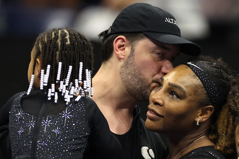 Serena Williams is greeted by her husband Alexis Ohanian. AFP