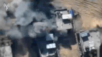 Aerial footage shows a building being hit by an Israeli air strike in Gaza. Reuters