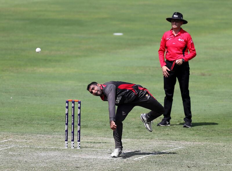 Dubai, United Arab Emirates - October 14, 2019: The UAE's Sultan Ahmed bowls during the ICC Mens T20 World cup qualifier warm up game between the UAE and Scotland. Monday the 14th of October 2019. International Cricket Stadium, Dubai. Chris Whiteoak / The National